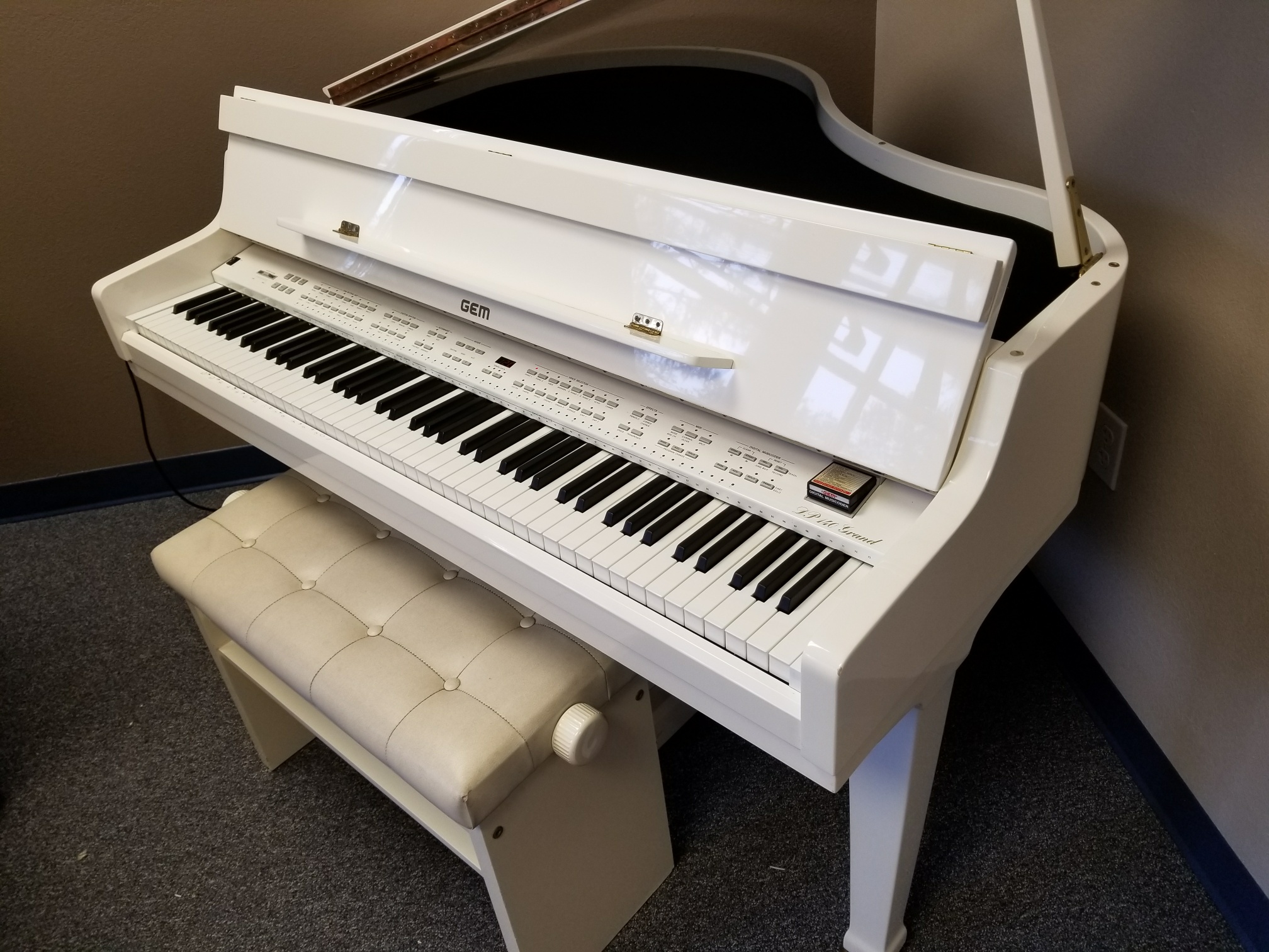 Used Ivory Digital Grand The Piano Guys